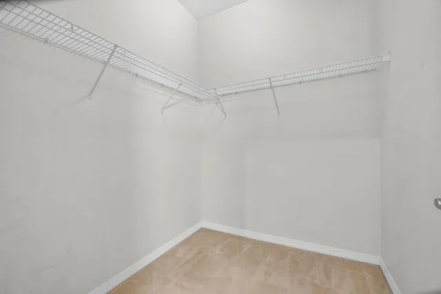 a view of a room with racks on the wall