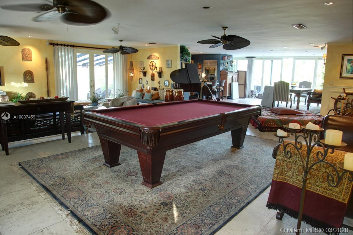 7975 Biscayne Point Circle Miami Beach, FL 33141 - Photo 21 of 34 a room with furniture pool table and flat screen tv