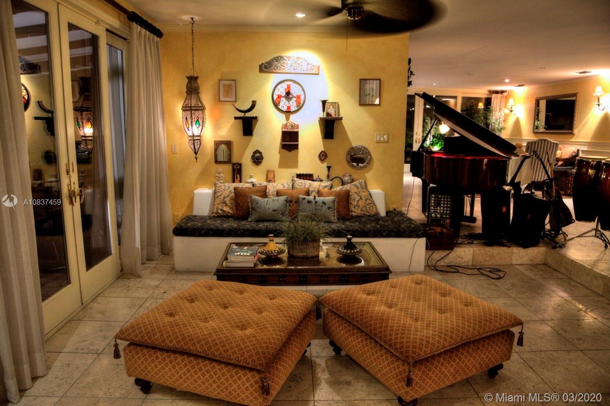 7975 Biscayne Point Circle Miami Beach, FL 33141 - Photo 23 of 34 a living room with furniture