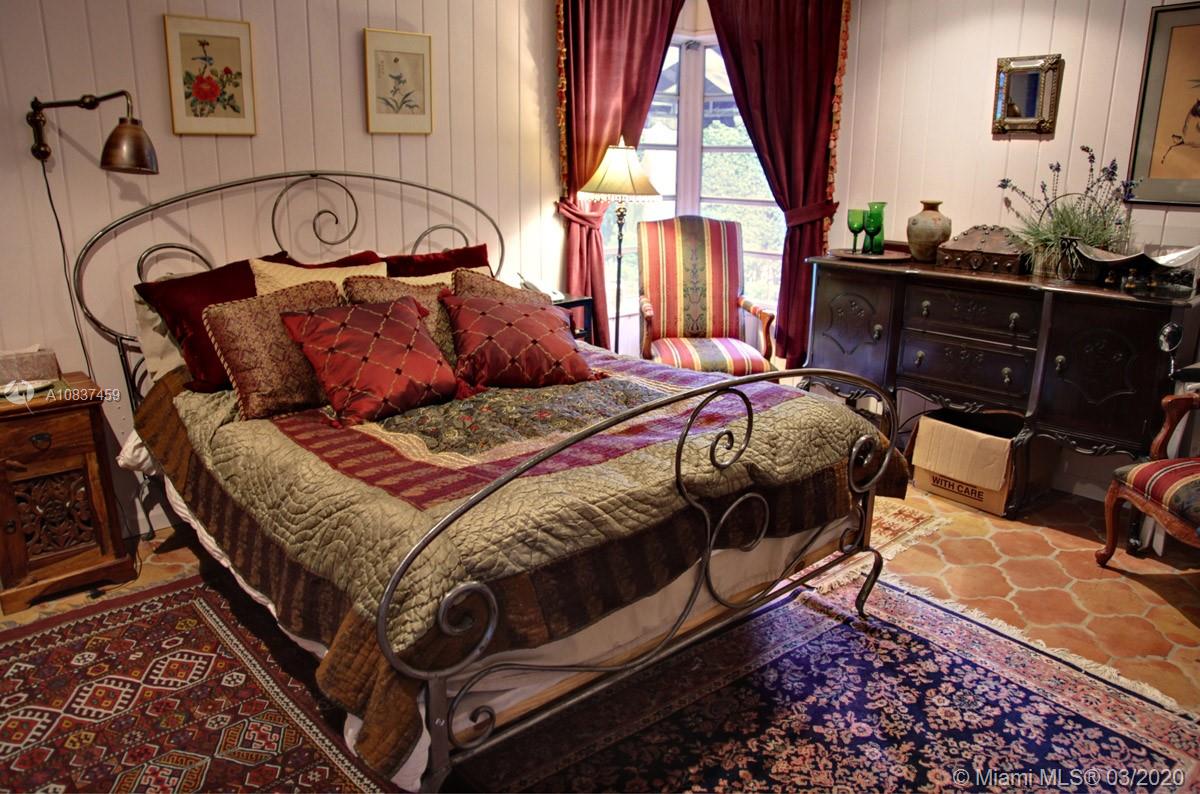 7975 Biscayne Point Circle Miami Beach, FL 33141 - Photo 25 of 34 a bedroom with a bed window and couch