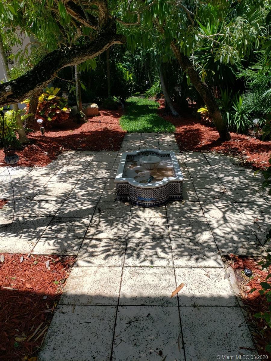 7975 Biscayne Point Circle Miami Beach, FL 33141 - Photo 4 of 34 a view of a street with an outdoor space