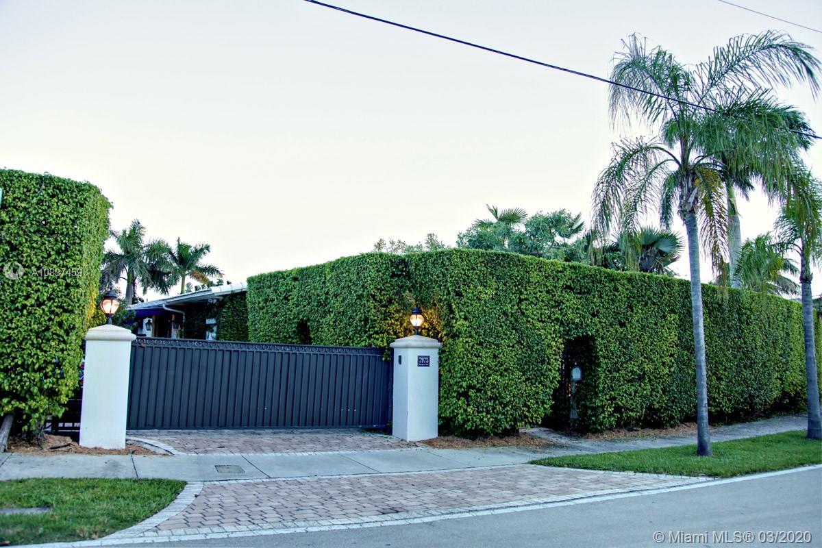 7975 Biscayne Point Circle Miami Beach, FL 33141 - Photo 6 of 34 a view of a garden