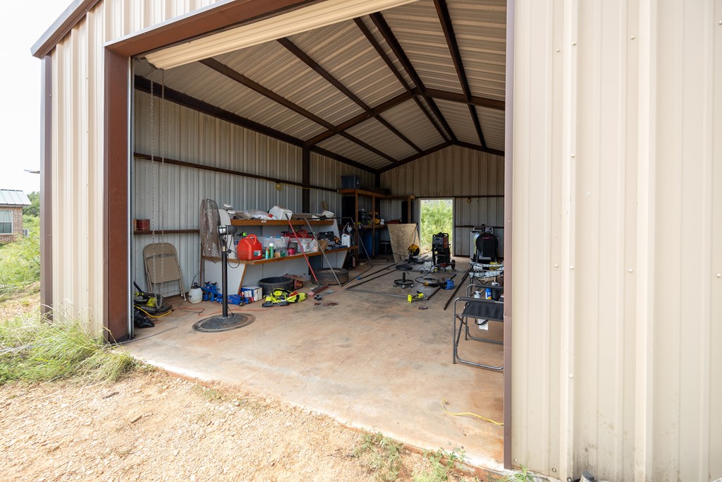 1596 Mule Creek Road Robert Lee, TX 76945 - Photo 27 of 98 a view of storage and utility room