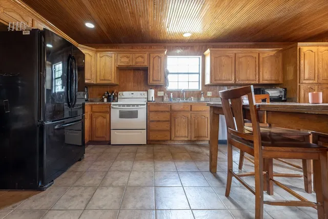 a bathroom with a shower and a toilet