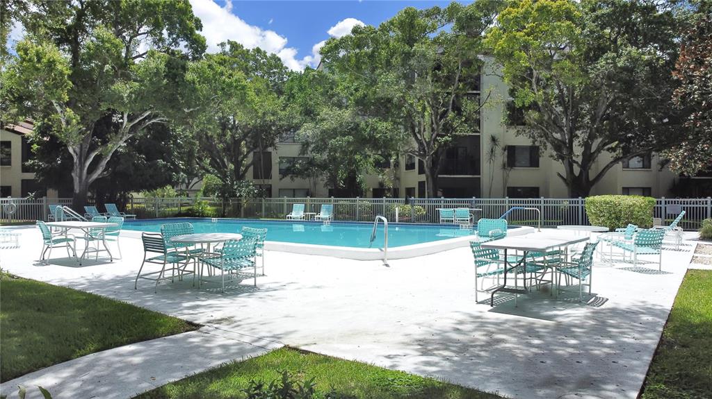 700 Starkey Road, Unit 511 Largo, FL 33771 - Photo 27 of 27 a view of a table and chairs in the patio