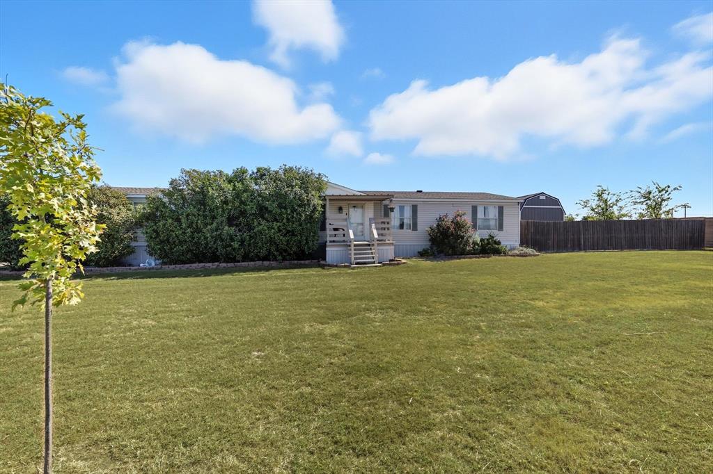 1200 Alliance Boulevard Rhome, TX 76078 - Photo 6 of 31 Back of property featuring a wooden deck