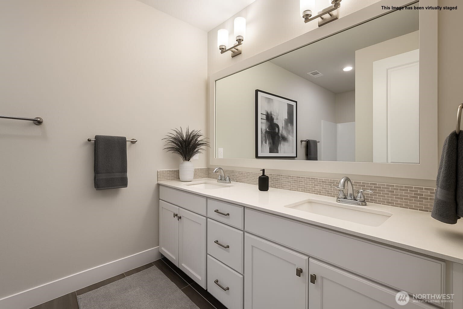 16529 White Mountain Road Southeast Monroe, WA 98272 - Photo 25 of 34 a bathroom with a double vanity sink and mirror