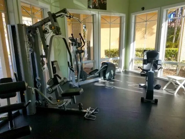 a view of a lake with houses in the back