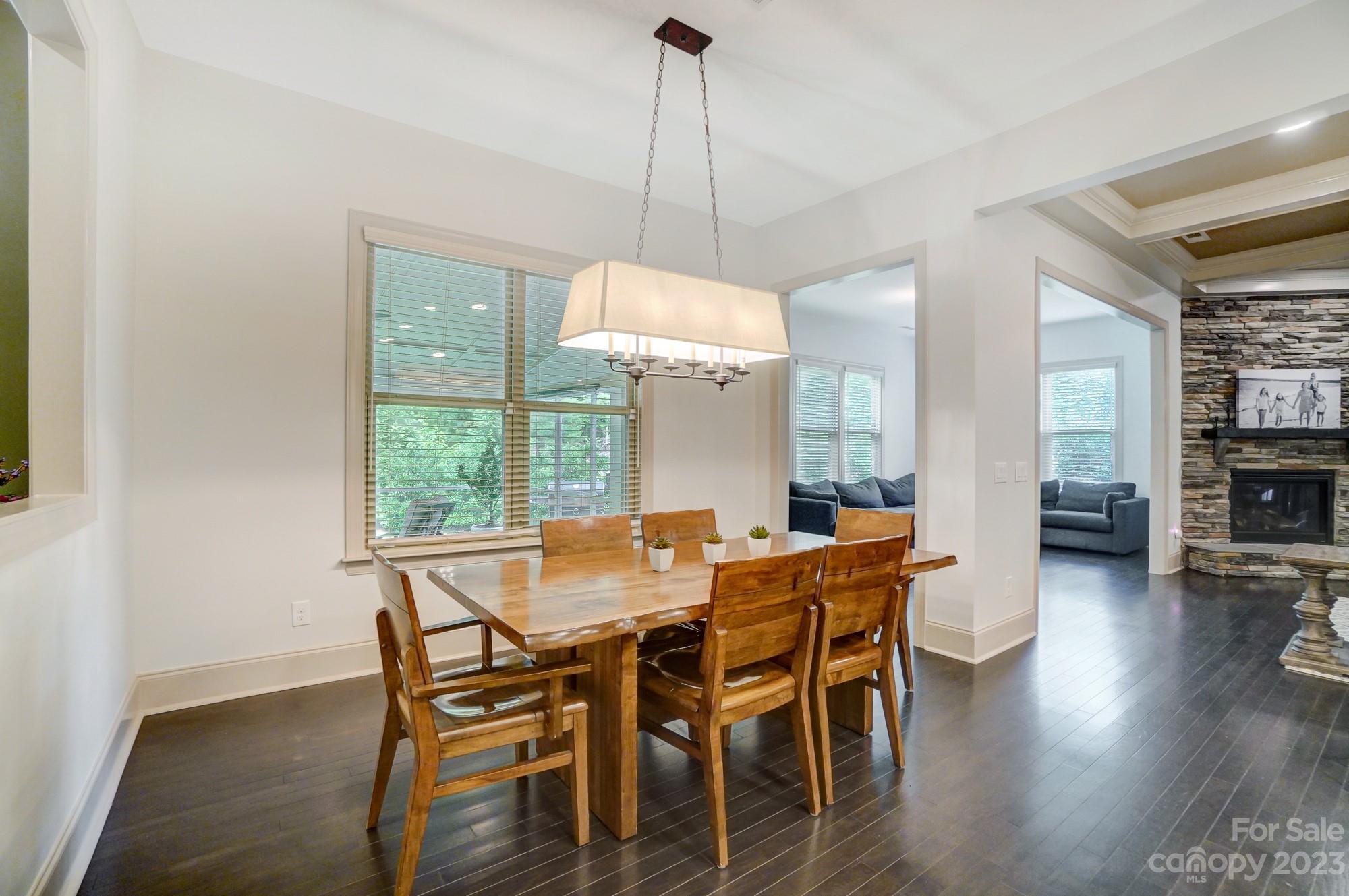 6030 Fallondale Road Waxhaw, NC 28173 - Photo 14 of 48 a dining room with furniture window wooden floor