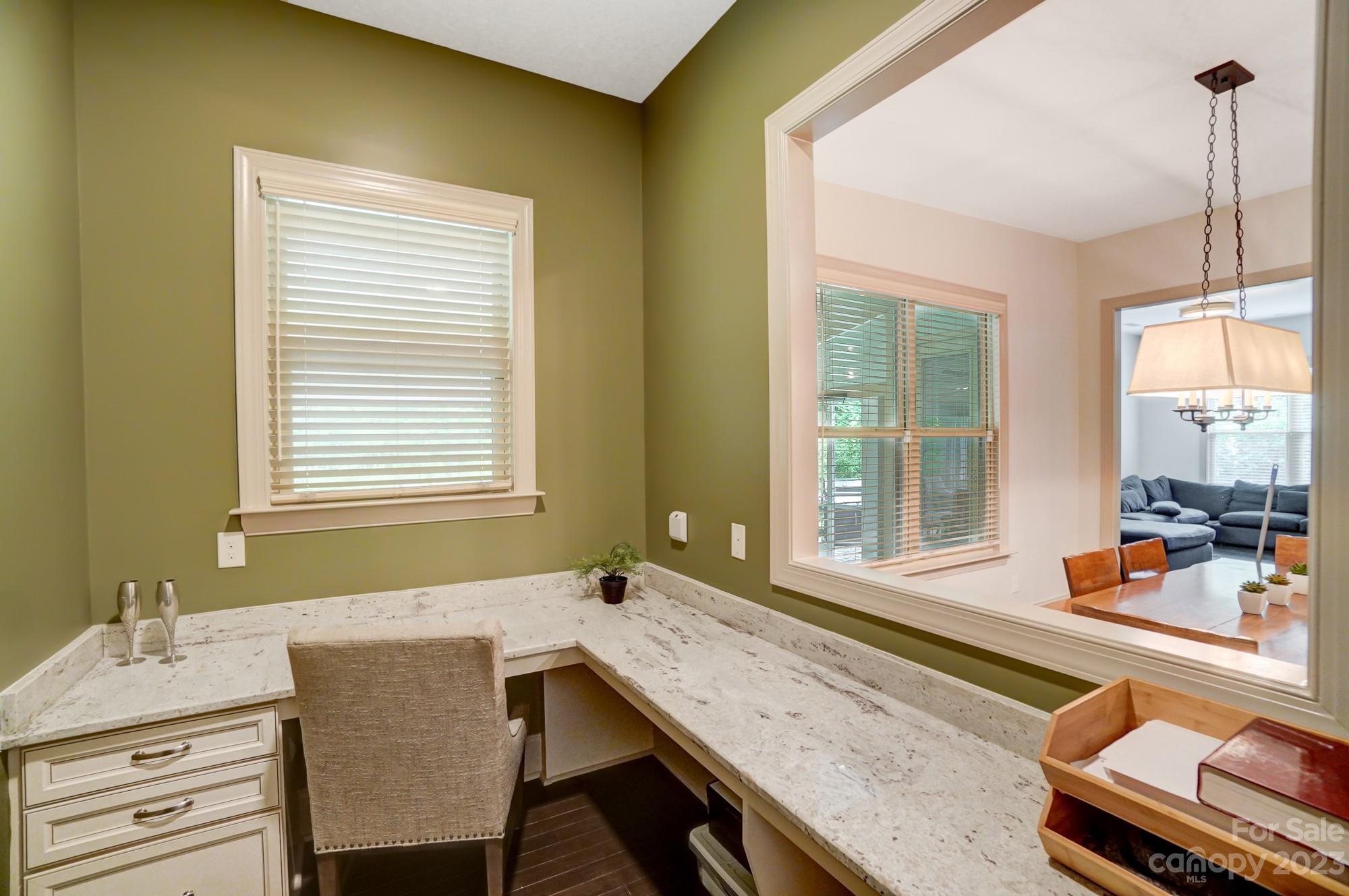 6030 Fallondale Road Waxhaw, NC 28173 - Photo 16 of 48 a bathroom with a granite countertop sink and a large mirror