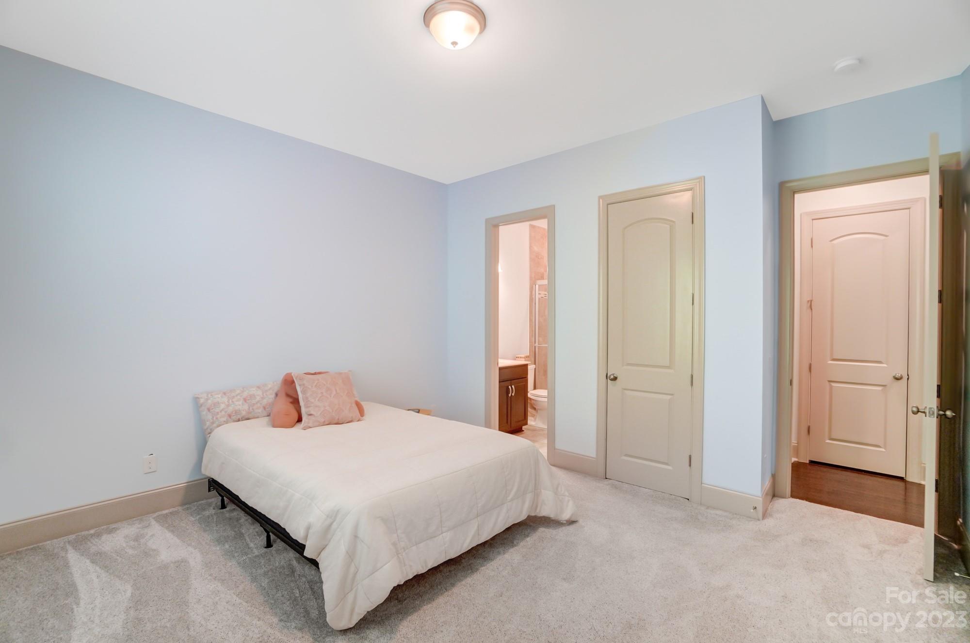 6030 Fallondale Road Waxhaw, NC 28173 - Photo 18 of 48 a bedroom with a bed and a window