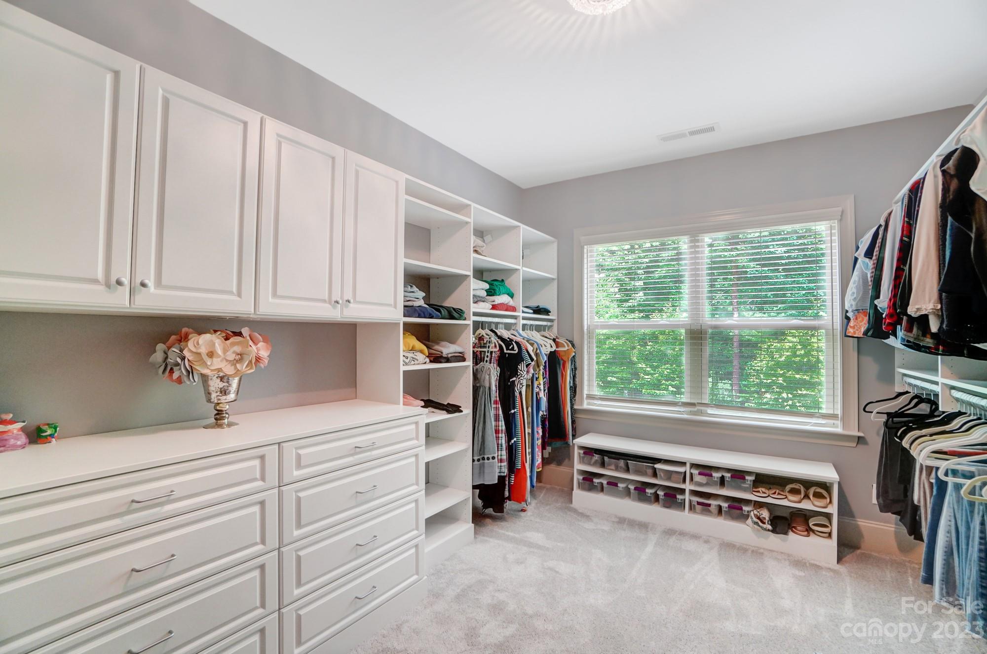 6030 Fallondale Road Waxhaw, NC 28173 - Photo 27 of 48 a view of a kitchen with fridge stove and a window