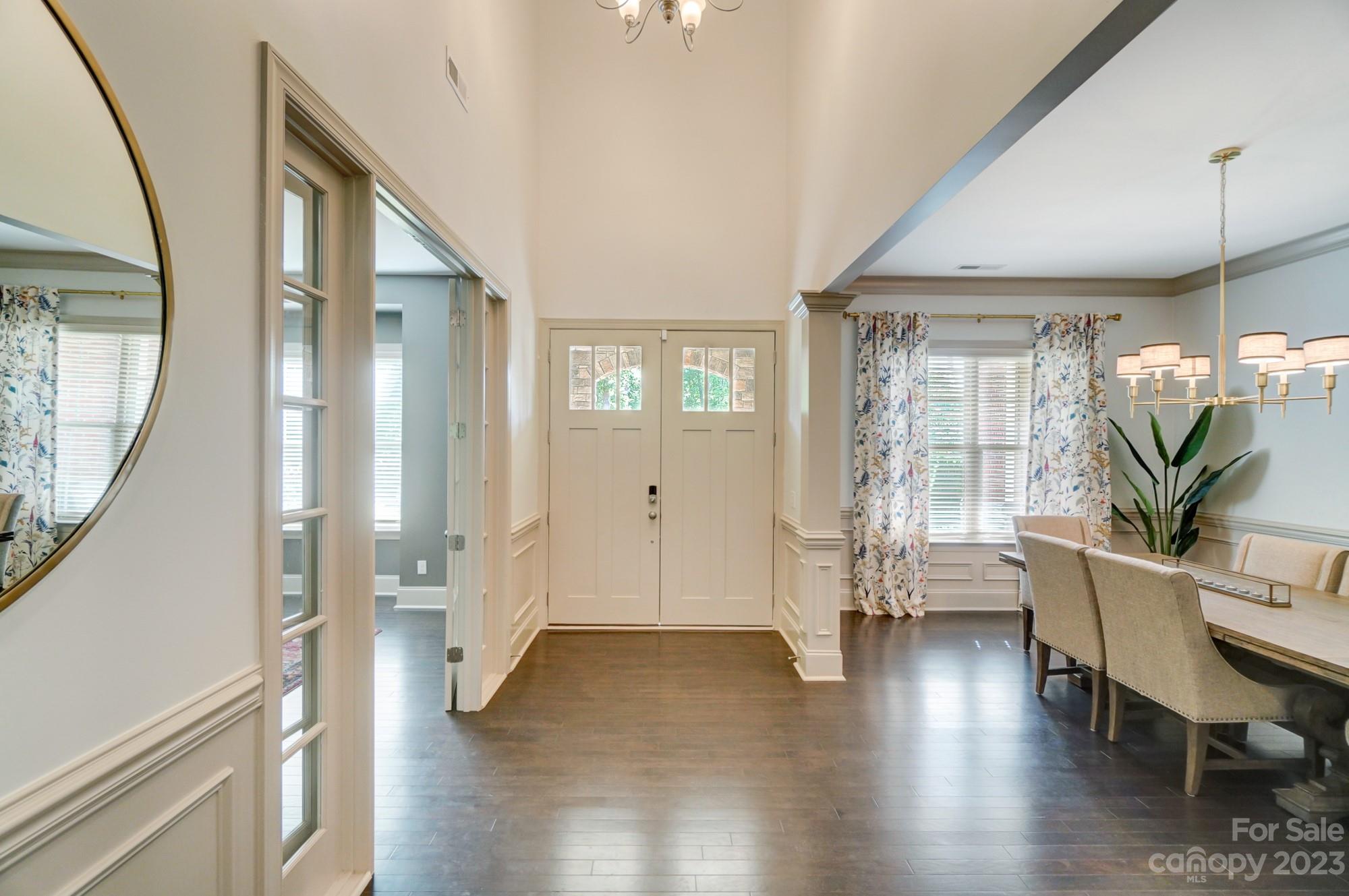 6030 Fallondale Road Waxhaw, NC 28173 - Photo 3 of 48 a view of an entryway with wooden floor