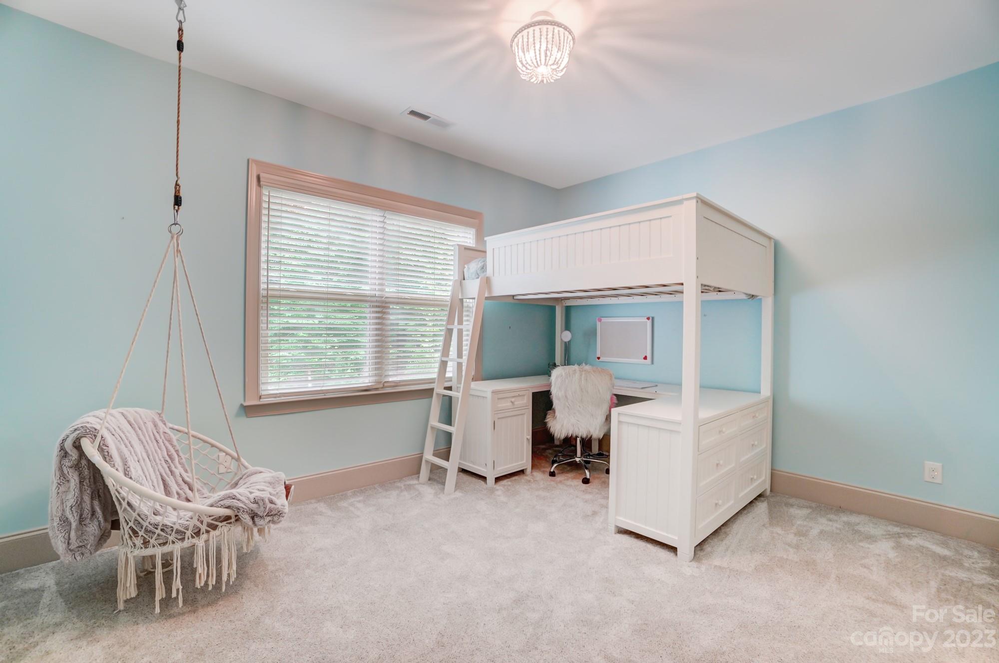 6030 Fallondale Road Waxhaw, NC 28173 - Photo 35 of 48 a bedroom with furniture and a window