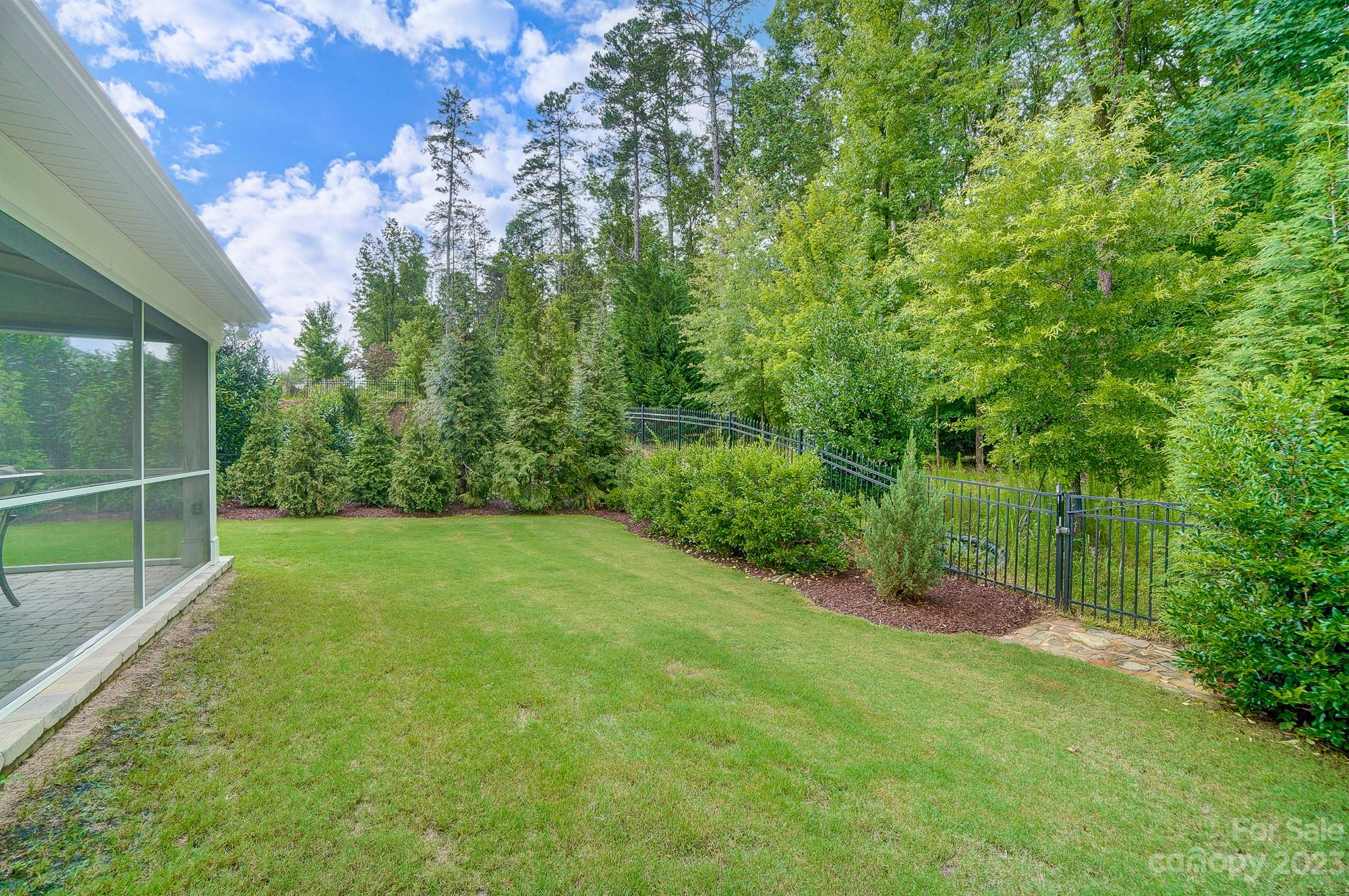 6030 Fallondale Road Waxhaw, NC 28173 - Photo 47 of 48 a view of a garden with a tree