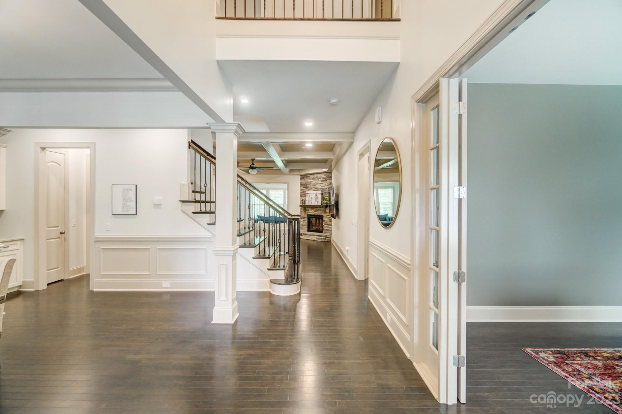 6030 Fallondale Road Waxhaw, NC 28173 - Photo 6 of 48 a view of entryway and hall with wooden floor