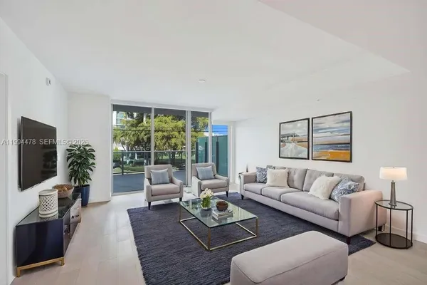 a view of kitchen with wooden floor