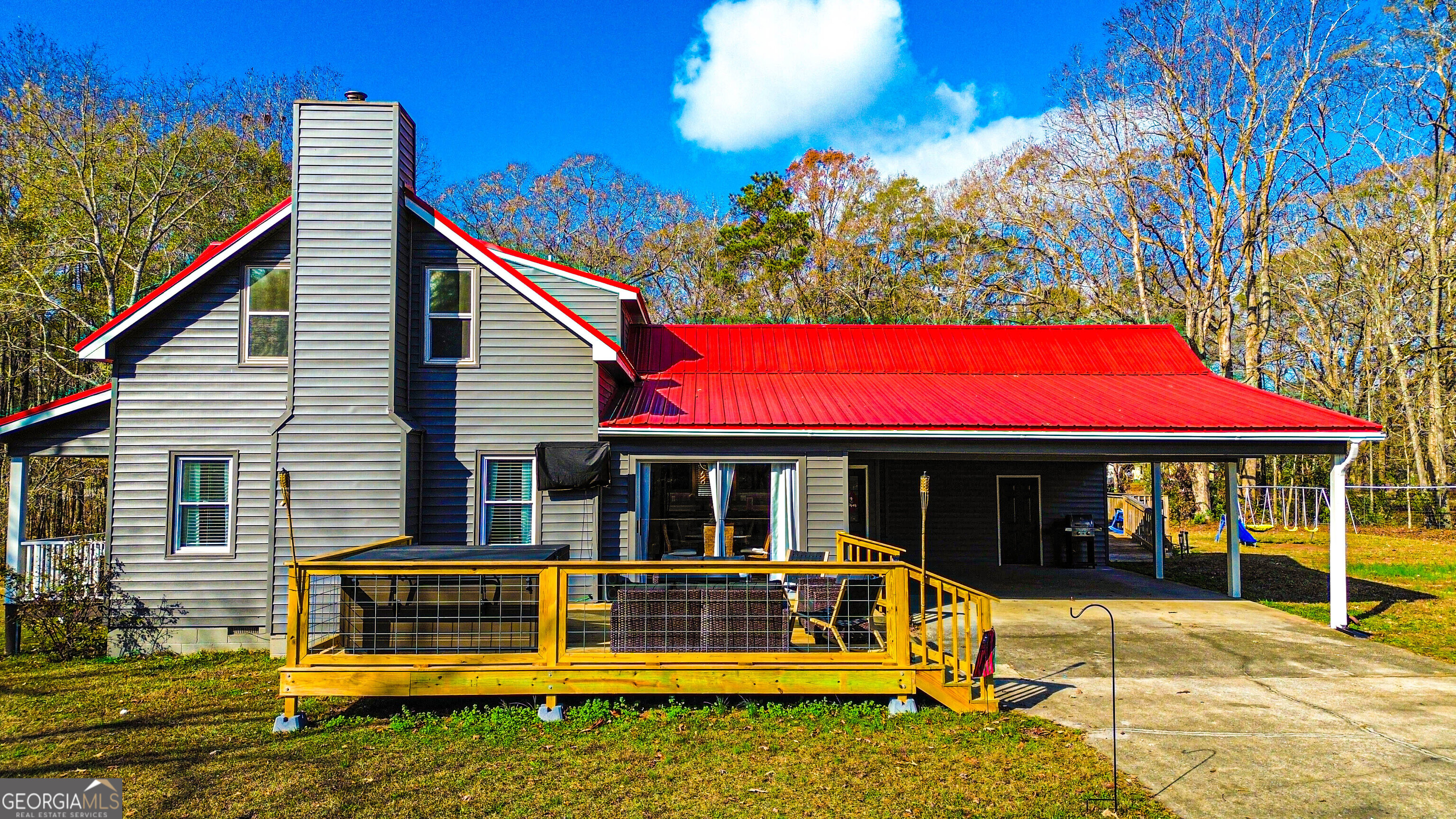 587 Highway 41 Milner, GA 30257 - Photo 130 of 172 a view of a house with a balcony