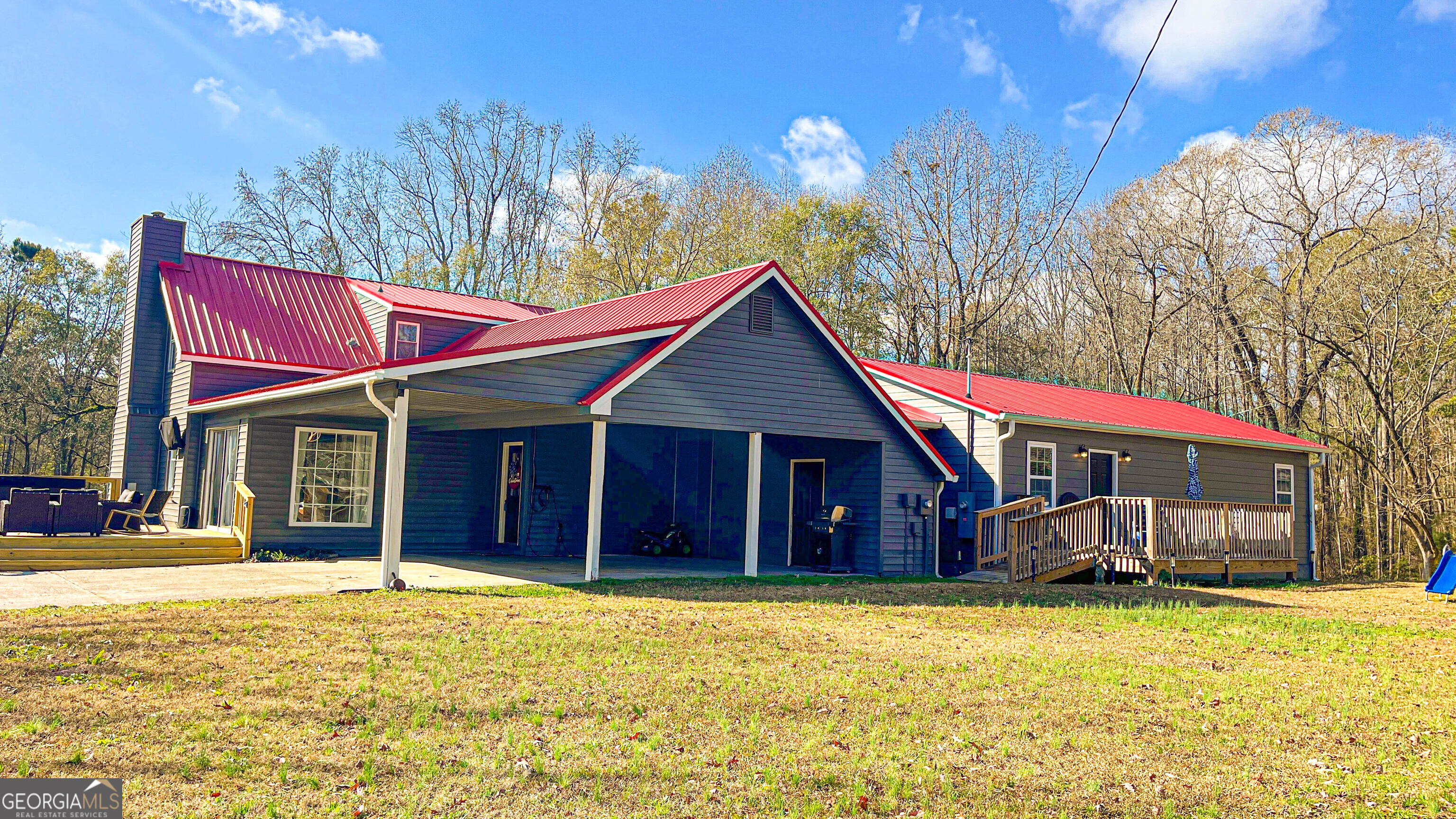 587 Highway 41 Milner, GA 30257 - Photo 136 of 172 a view of a house with a yard and swimming pool