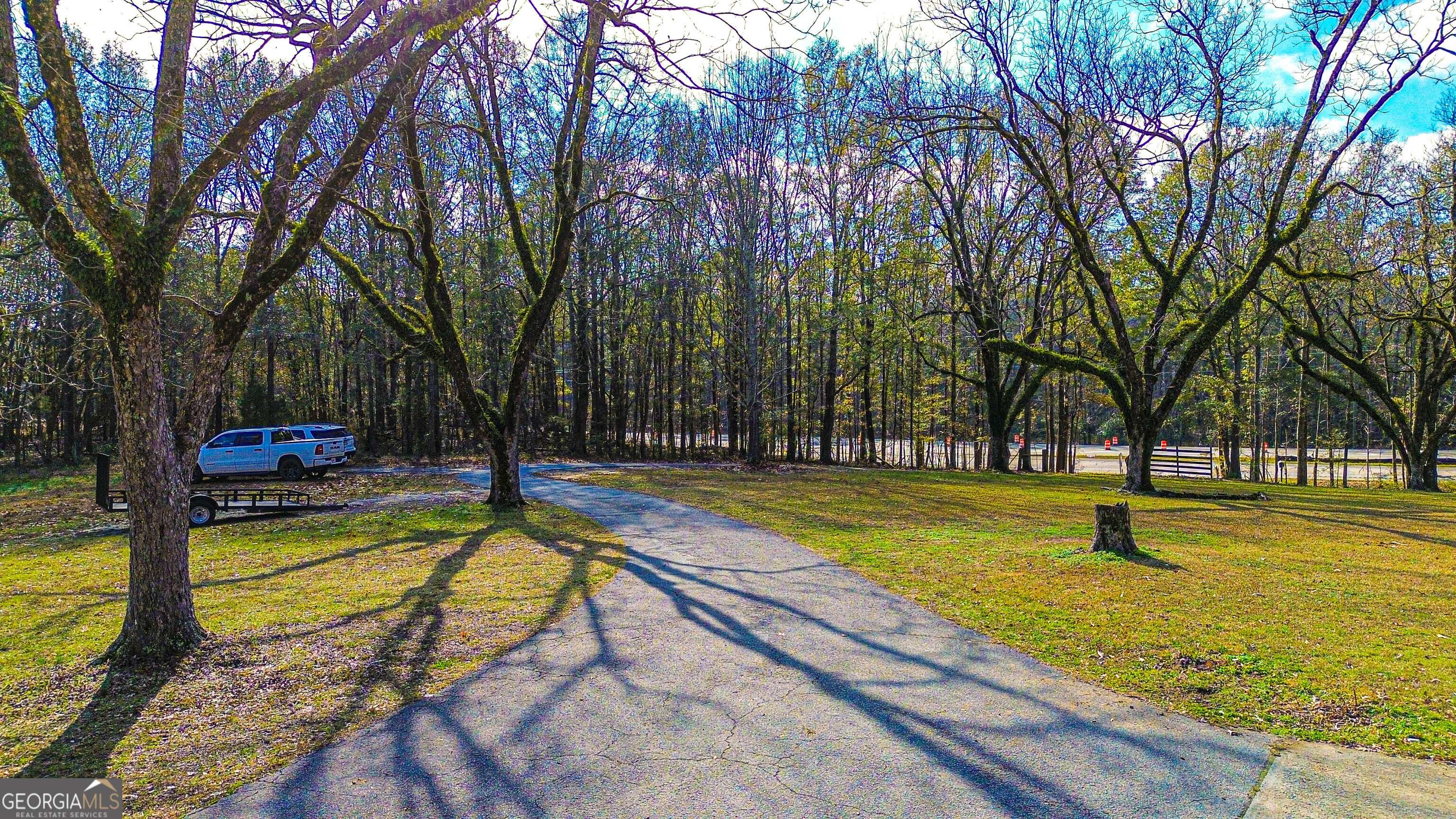 587 Highway 41 Milner, GA 30257 - Photo 141 of 172 a view of swimming pool with trees