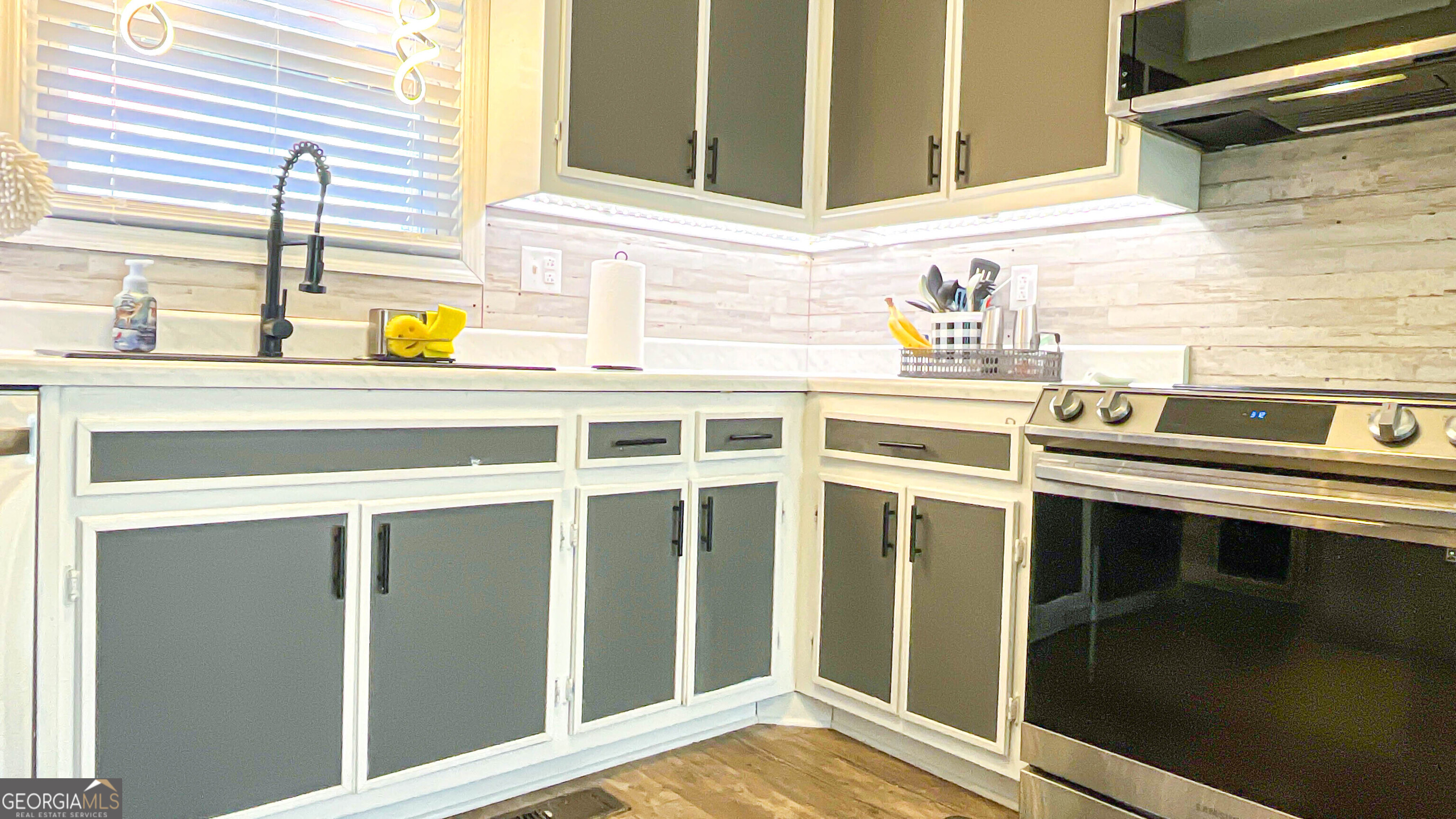 587 Highway 41 Milner, GA 30257 - Photo 30 of 172 a kitchen with a sink and a window