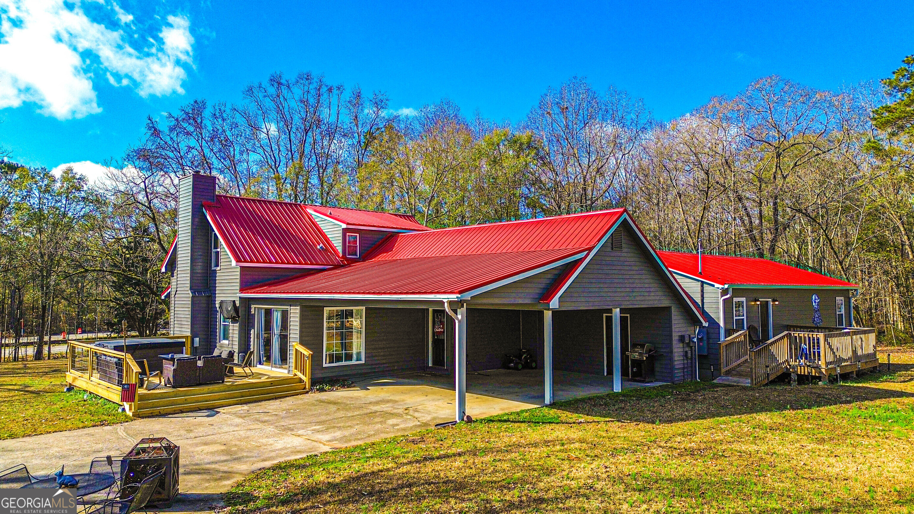 587 Highway 41 Milner, GA 30257 - Photo 42 of 172 a view of a house with swimming pool and sitting area