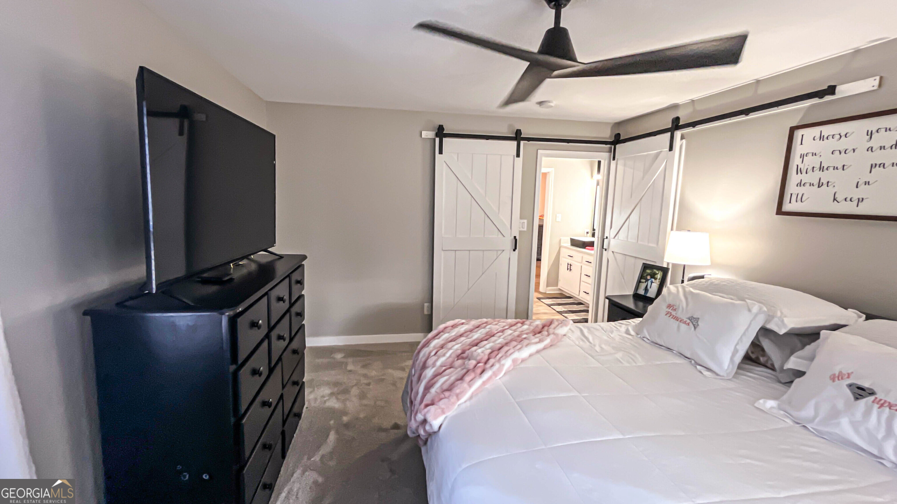 587 Highway 41 Milner, GA 30257 - Photo 50 of 172 a bedroom with a bed window and a flat tv screen