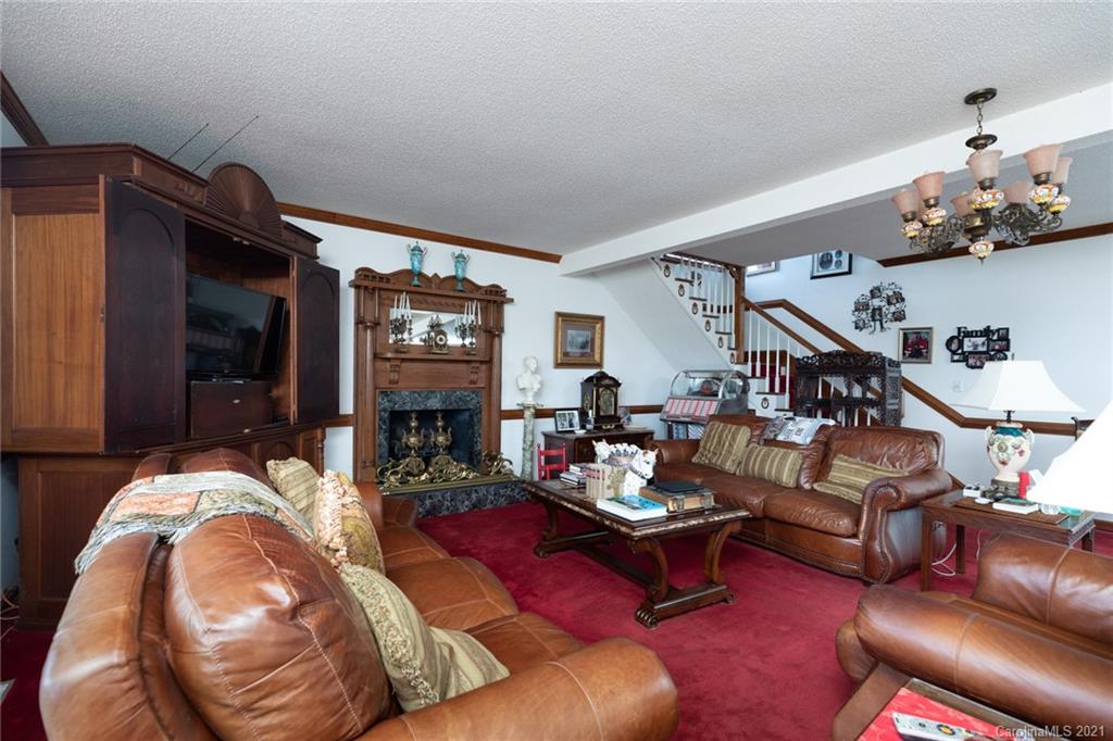 6013 Laney Rogers Road Monroe, NC 28112 - Photo 21 of 43 a living room with furniture and wooden floor