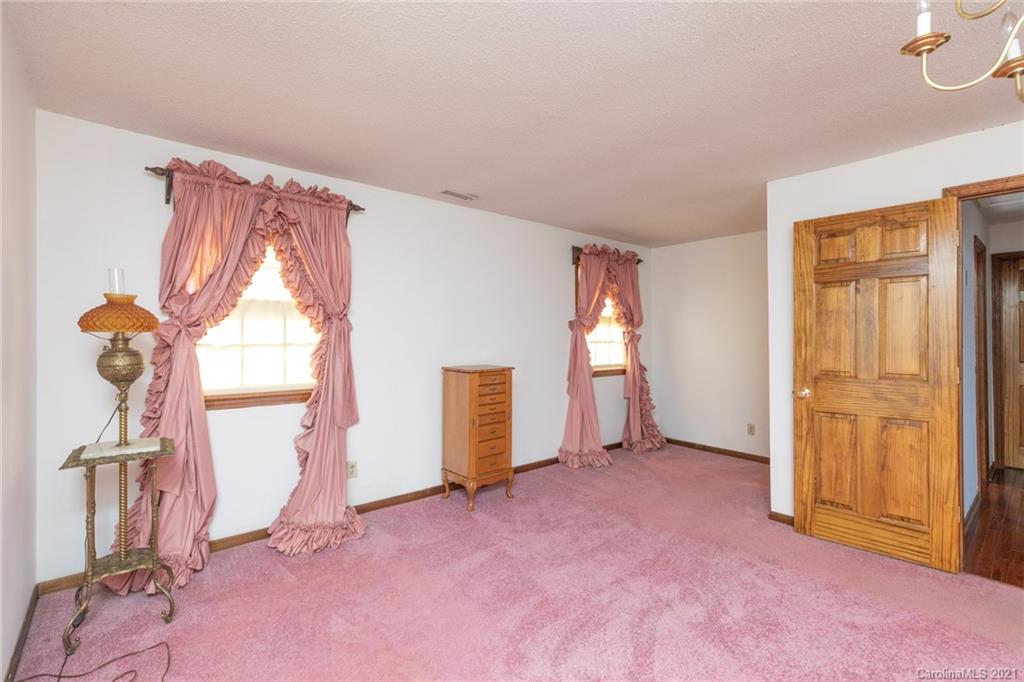 6013 Laney Rogers Road Monroe, NC 28112 - Photo 33 of 43 an empty room with windows and closet