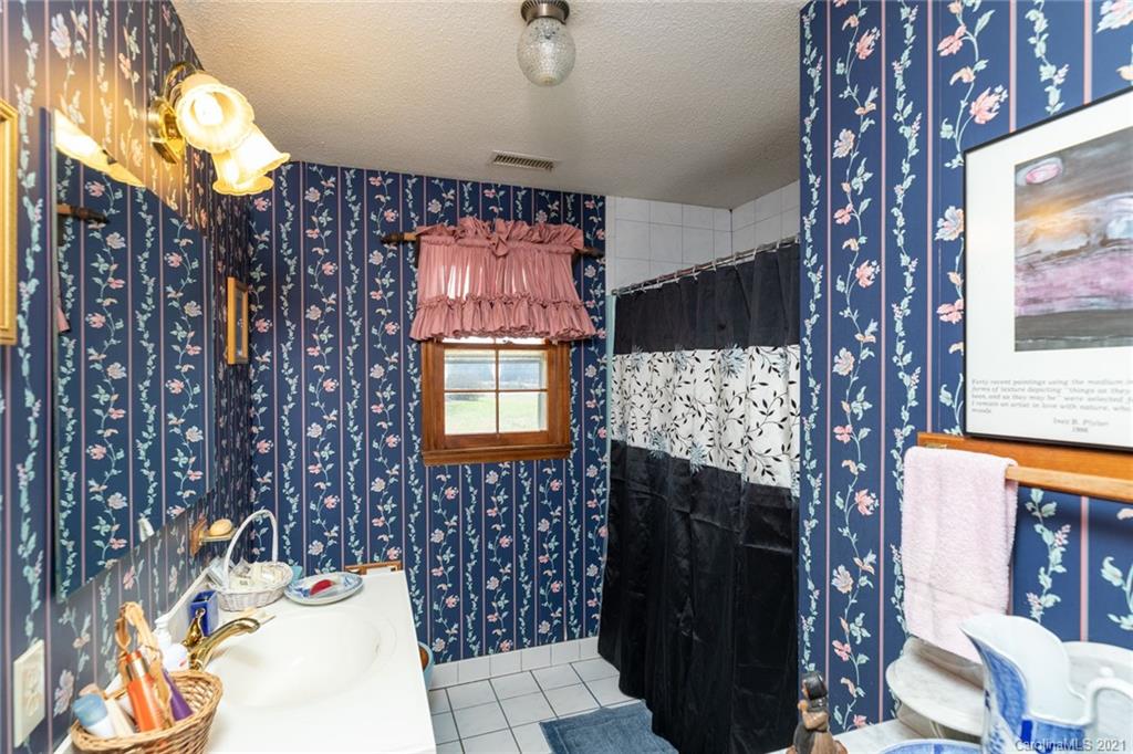 6013 Laney Rogers Road Monroe, NC 28112 - Photo 38 of 43 a bathroom with a sink and a shower
