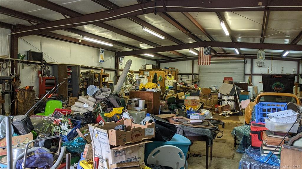 6013 Laney Rogers Road Monroe, NC 28112 - Photo 40 of 43 a view of a storage room with lots of stuff