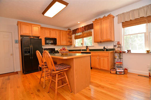 259 Patterson Mill Road Grottoes, VA 24441 - Photo 15 of 26 a view of a kitchen with a table and chairs