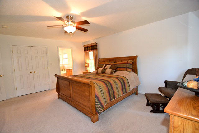 259 Patterson Mill Road Grottoes, VA 24441 - Photo 18 of 26 a bedroom with a bed and window