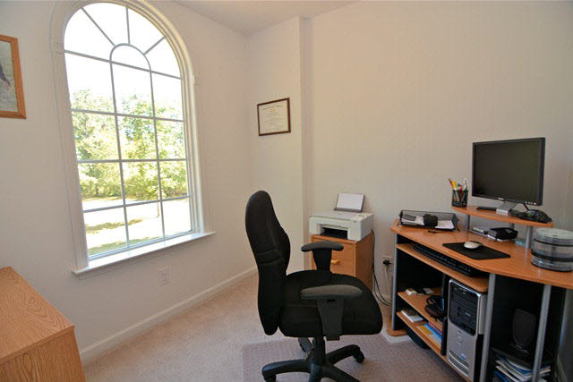 259 Patterson Mill Road Grottoes, VA 24441 - Photo 21 of 26 a view of a workspace with furniture and a window