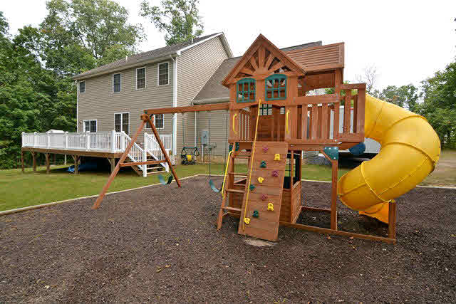 259 Patterson Mill Road Grottoes, VA 24441 - Photo 5 of 26 a view of a house with a yard patio and a slide