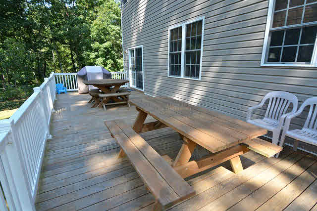 259 Patterson Mill Road Grottoes, VA 24441 - Photo 8 of 26 a view of backyard with a deck and furniture