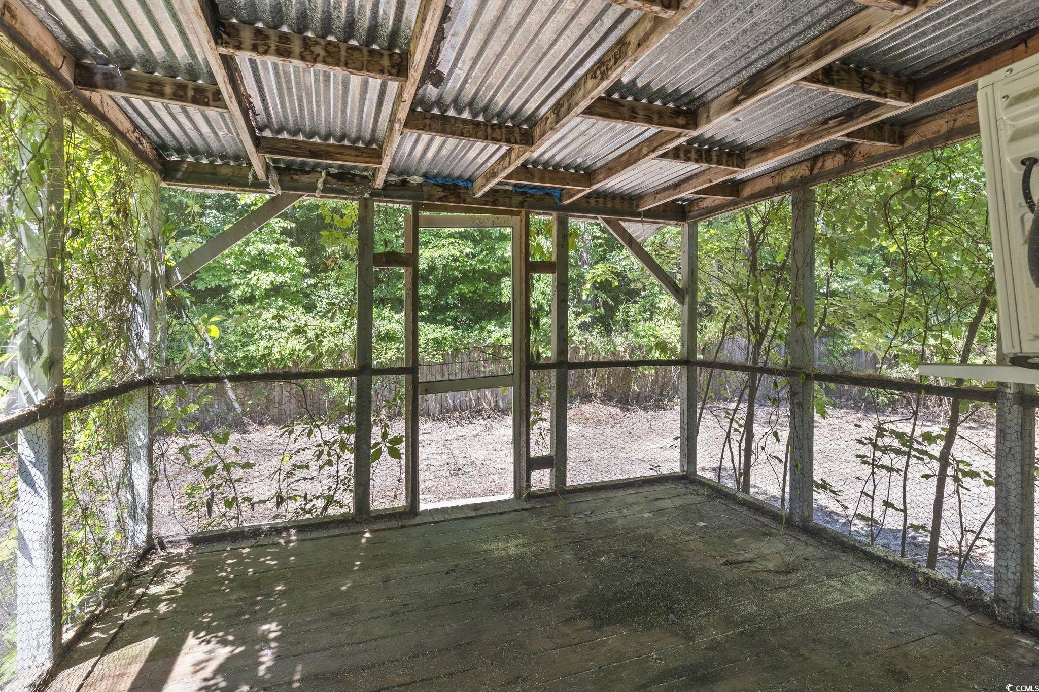 718 Reef Road Myrtle Beach, SC 29588 - Photo 20 of 20 View of unfurnished sunroom