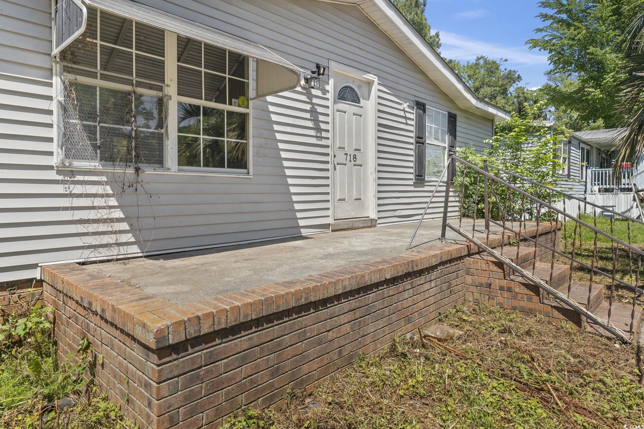 718 Reef Road Myrtle Beach, SC 29588 - Photo 3 of 20 View of property entrance