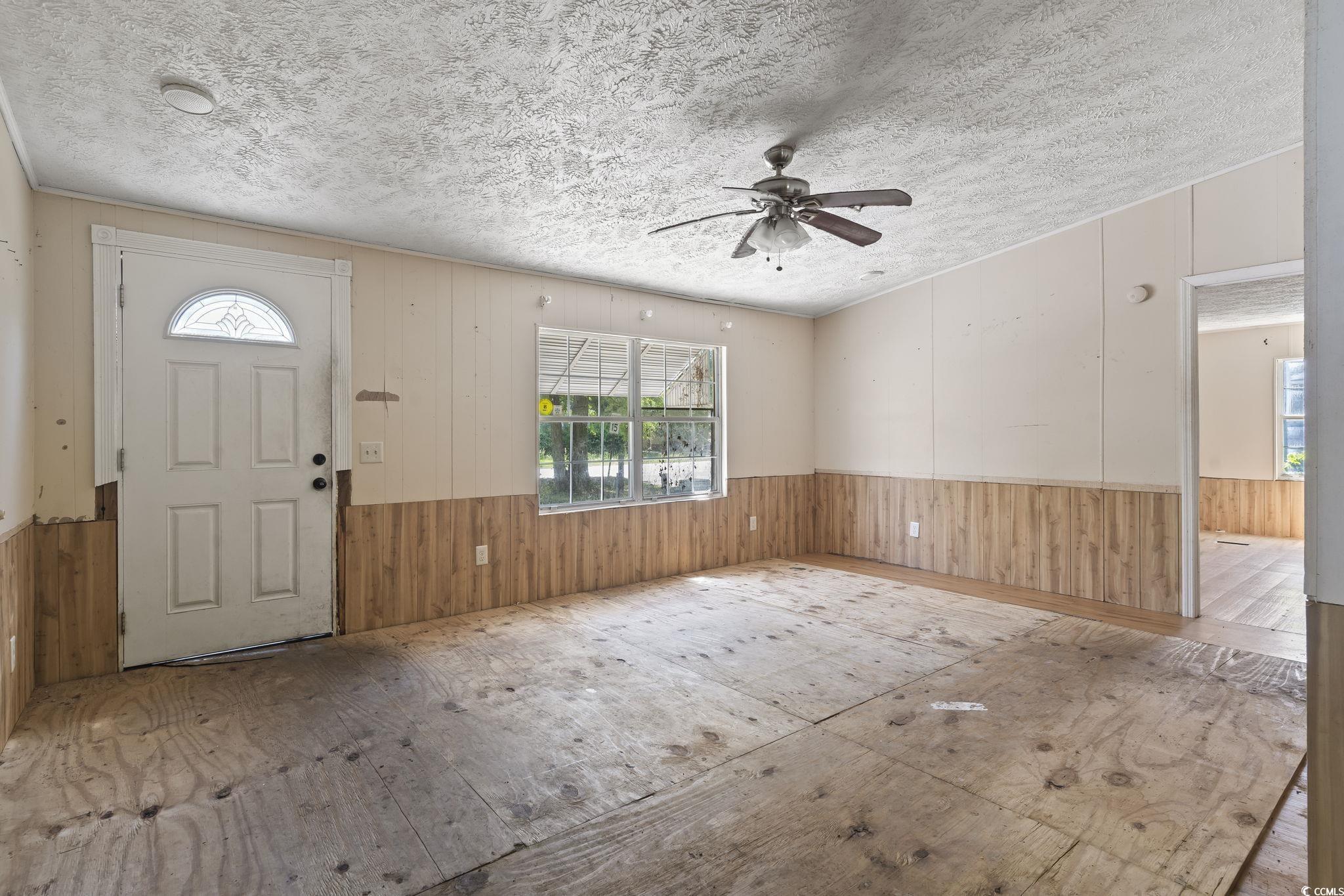 718 Reef Road Myrtle Beach, SC 29588 - Photo 5 of 20 Foyer entrance featuring plenty of natural light,