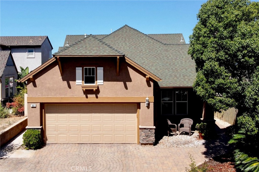 563 Poets Square Fallbrook, CA 92028 - Photo 1 of 1 a front view of a house with a yard