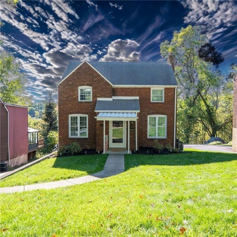 290 Barclay Avenue Pittsburgh, PA 15221 - Photo 1 of 29 a house view with a garden space
