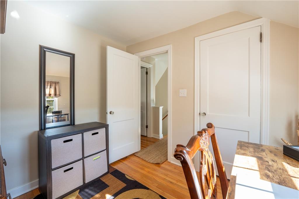 290 Barclay Avenue Pittsburgh, PA 15221 - Photo 18 of 29 a bedroom with a bed and a dresser