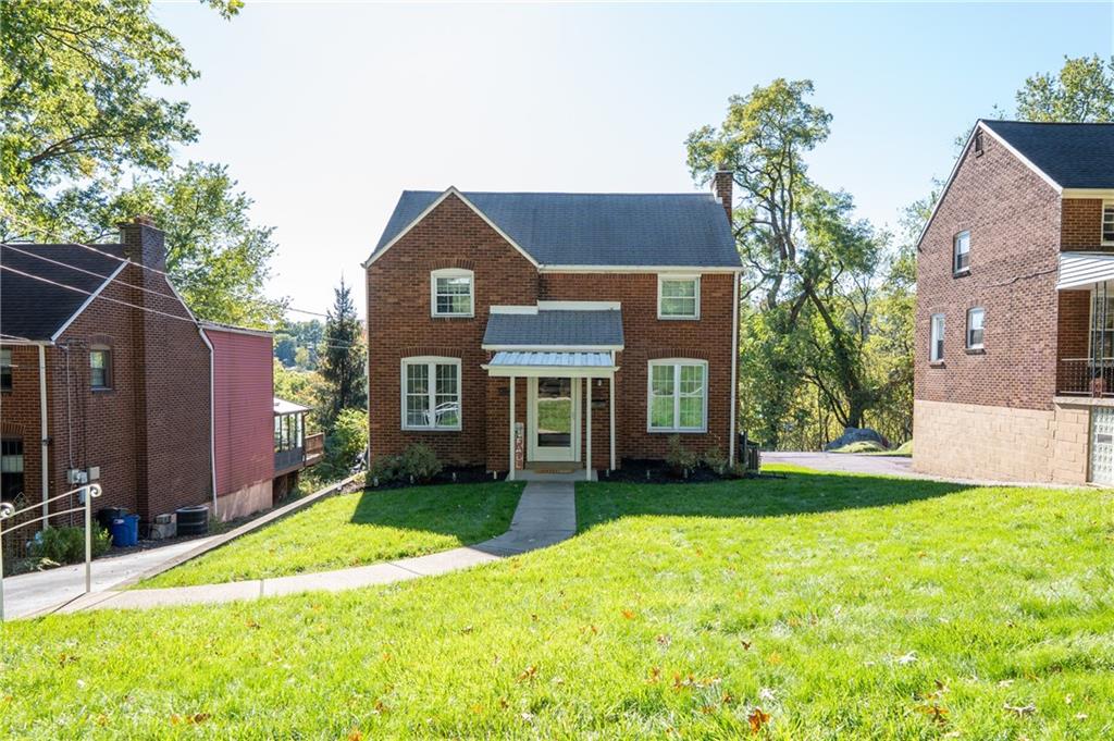 290 Barclay Avenue Pittsburgh, PA 15221 - Photo 29 of 29 a house that has a big yard in front of it