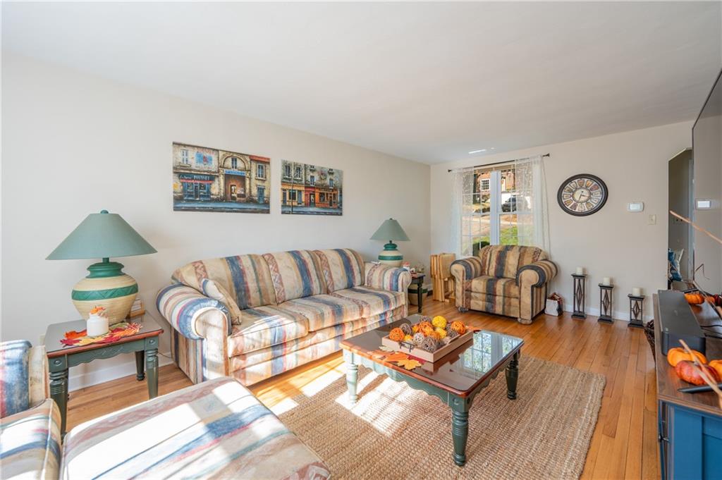 290 Barclay Avenue Pittsburgh, PA 15221 - Photo 7 of 29 a living room with furniture and a couch