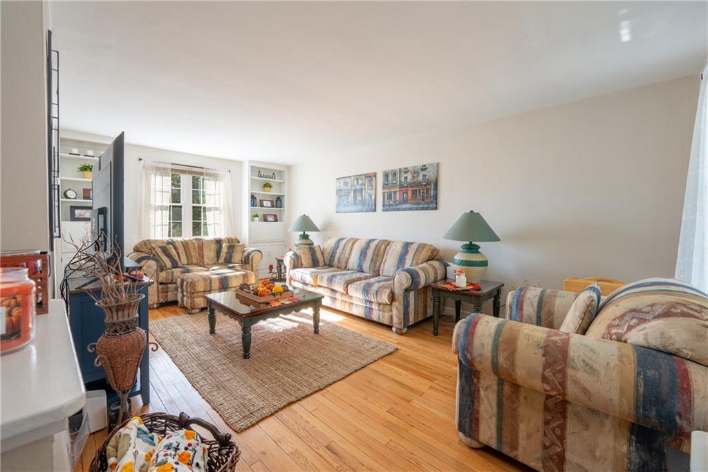 290 Barclay Avenue Pittsburgh, PA 15221 - Photo 8 of 29 a living room with furniture and a couch