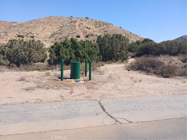 a view of a backyard of a house