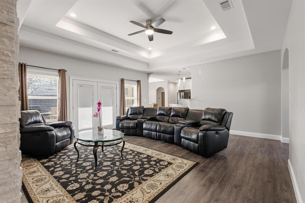 104 4th Street Trenton, TX 75490 - Photo 6 of 33 a living room with furniture and a rug