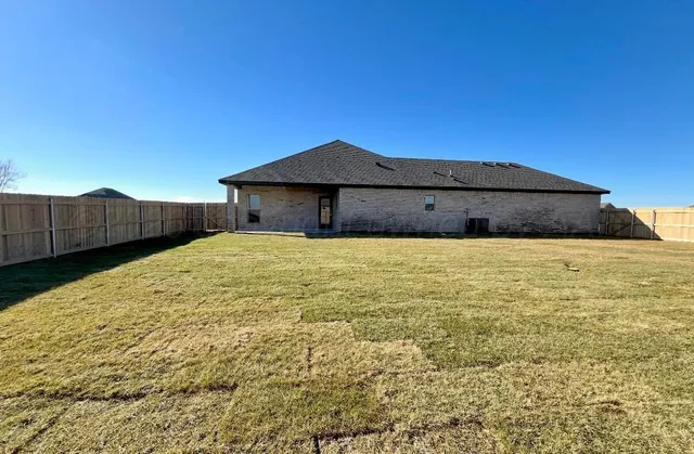 a house view with a outdoor space