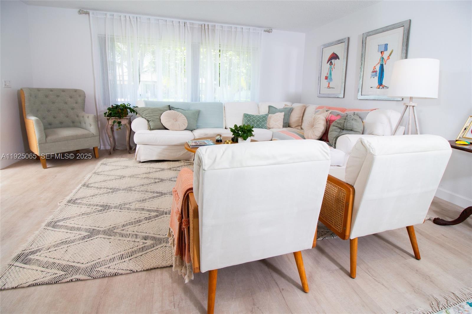 107 Winged Foot Lane Boca Raton, FL 33431 - Photo 11 of 46 a living room with furniture and a table