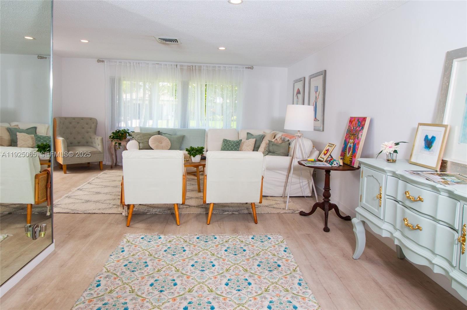 107 Winged Foot Lane Boca Raton, FL 33431 - Photo 13 of 46 a view of a workspace with furniture and a living room